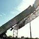 Illustration for article titled How did a truck crash on top of this Houston freeway sign?